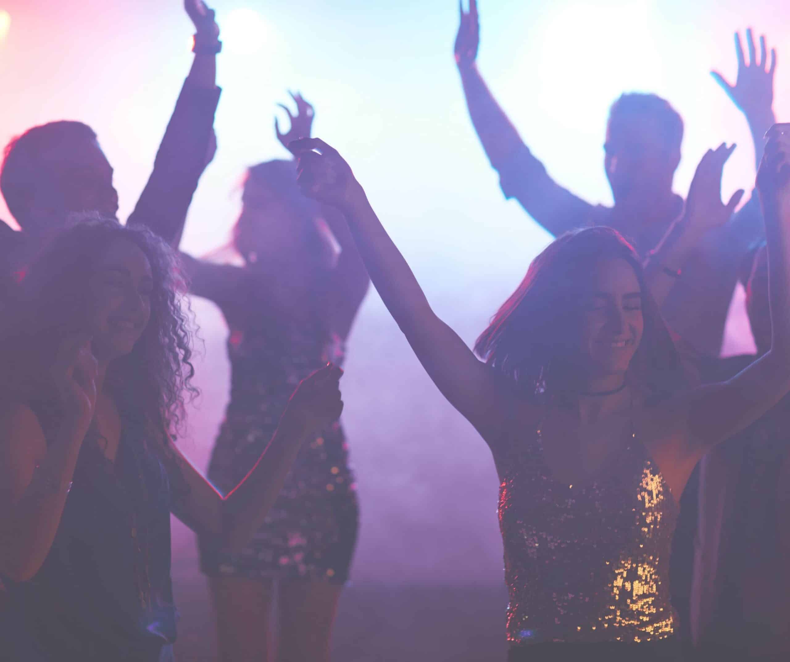 friends dancing at a club